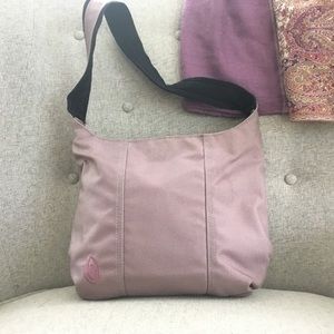 Pink Timbuk2 shoulder bag.
